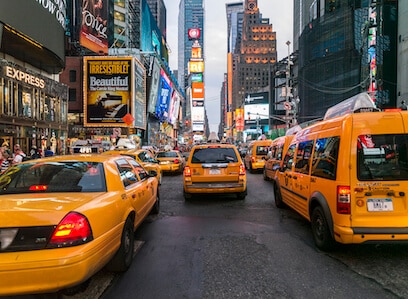 Vibrant Times Square, commercial heart of NYC with bustling traffic.